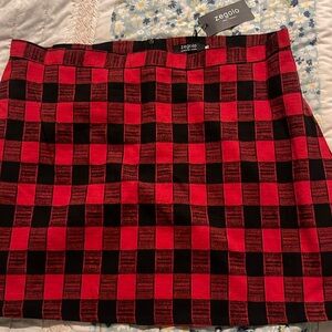 Brand new skirt great for holidays. Short skirt bright colors red and black.